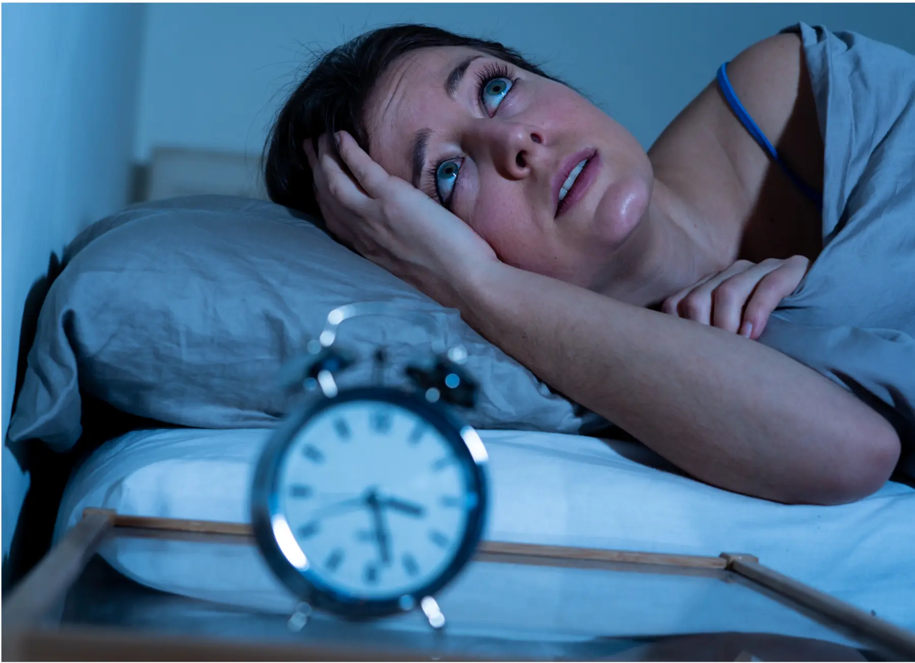 Woman awake at night experiencing sleep changes