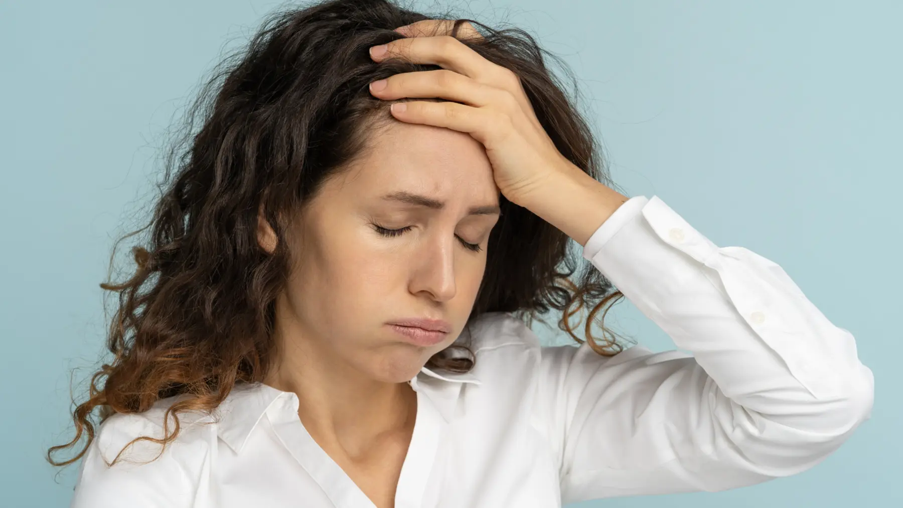 Woman feeling overwhelmed during perimenopause