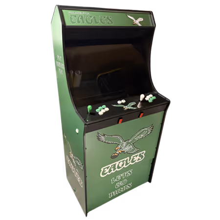 Green arcade game machine featuring Philadelphia Eagles logo and text 'EAGLES LET'S GO BIRDS' with buttons and joysticks on control panel.