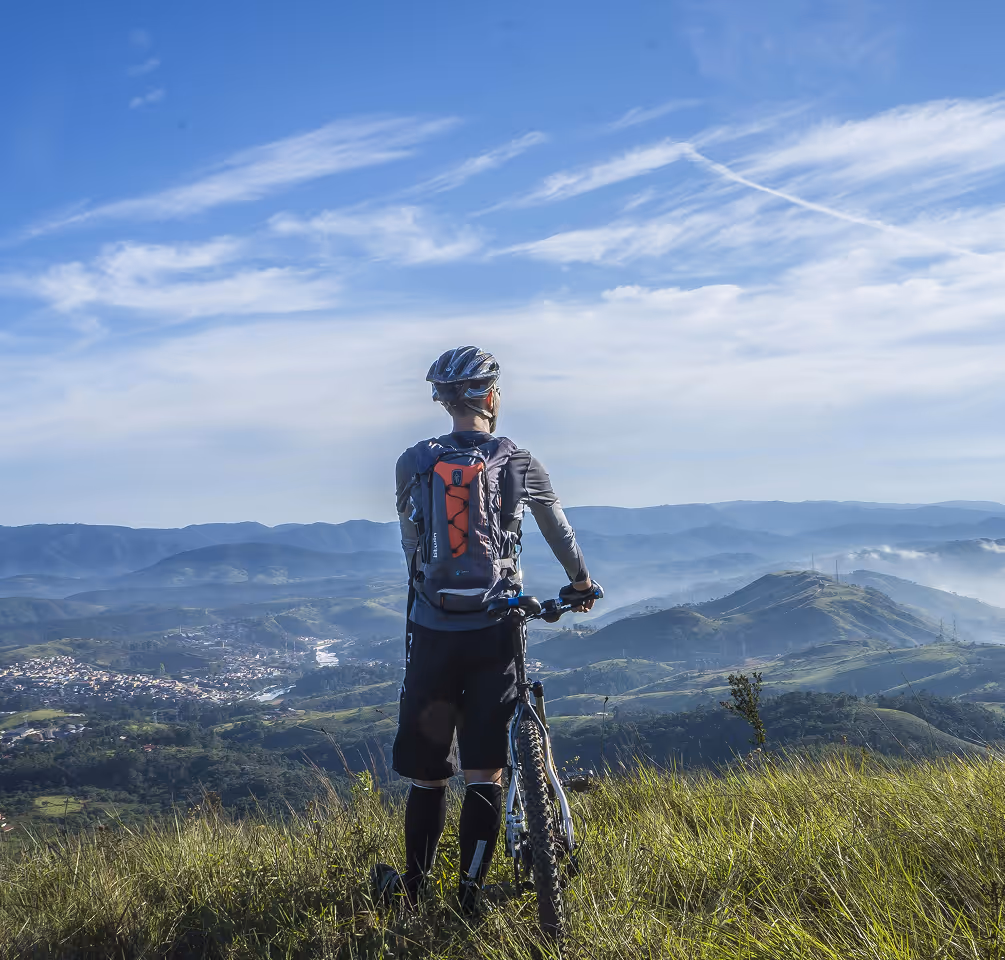 man biking on mountain top