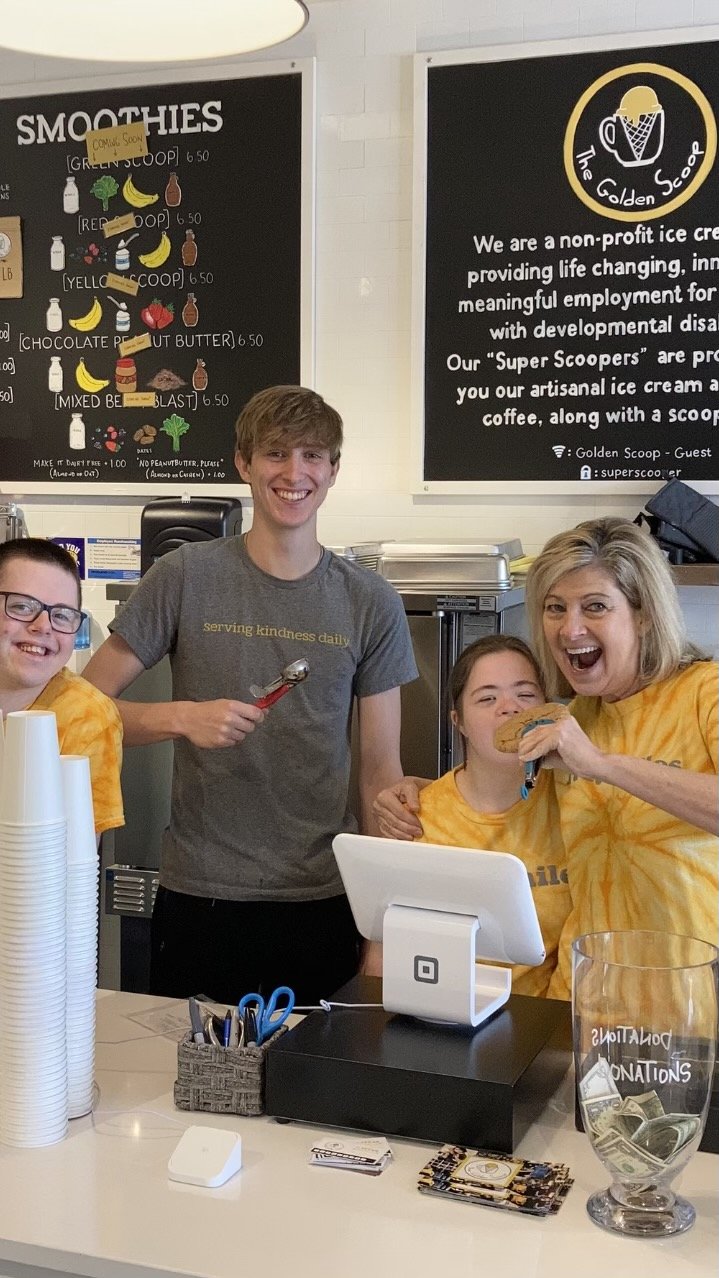 image of people in front of cash register