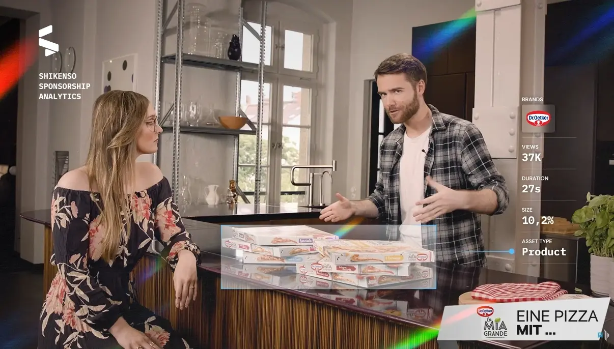 Esports event stage and player with sponsorship pie chart overlay.