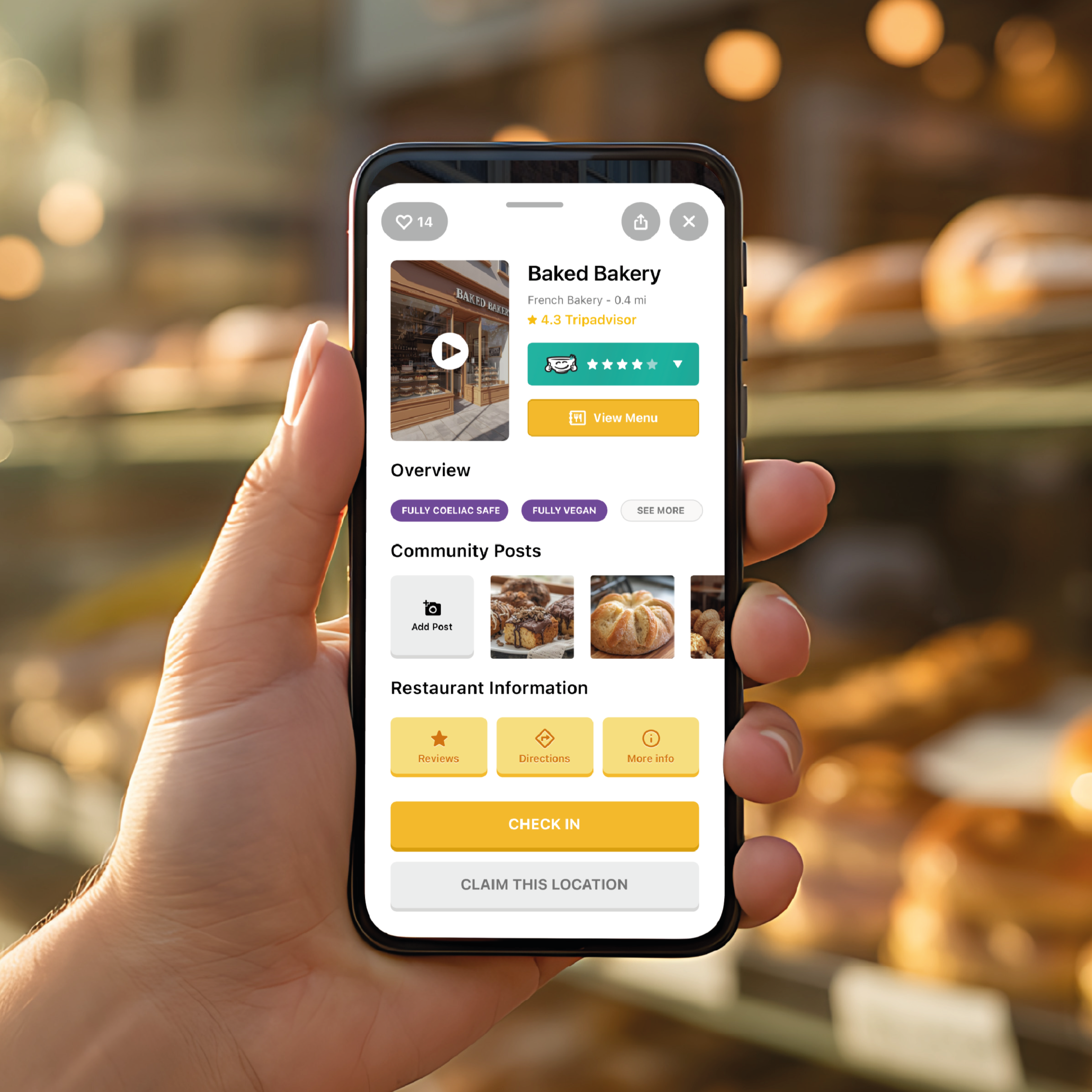 The Freeater app is pictured showing information on an eatery in this case a bakery. In the background is the bakery that the user is reviewing on the screen - deciding whether the eatery can cater to them on the app.