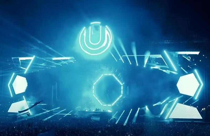 A stage at Ultra Music Festival Miami with blue visual effects.