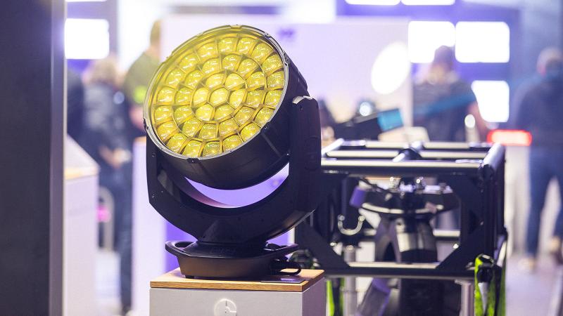 Yellow hued light illuminating a lit space.