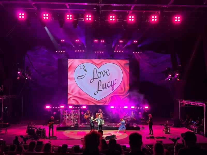 Pink light on stage with Weird Al