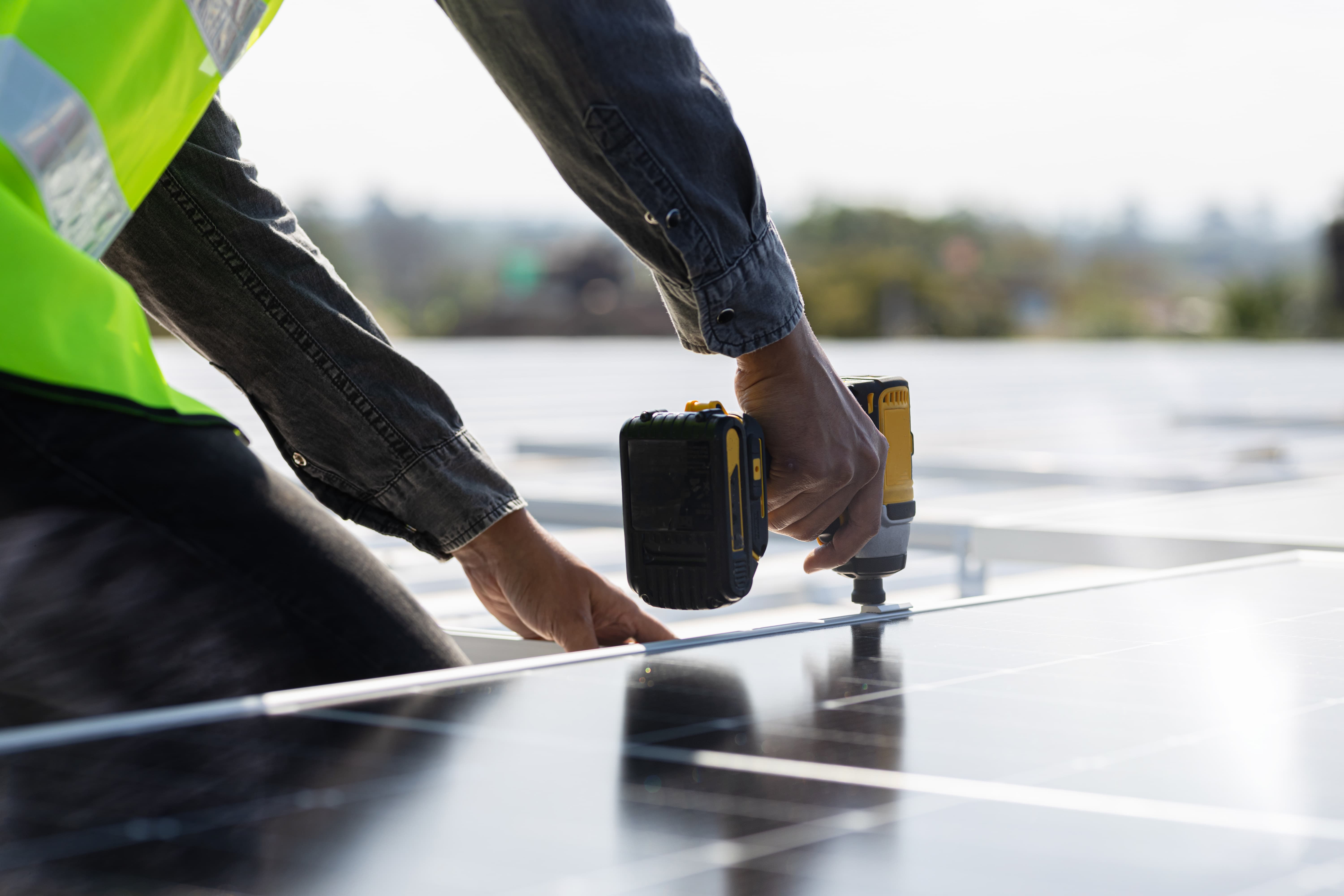 Installing a solar panel.