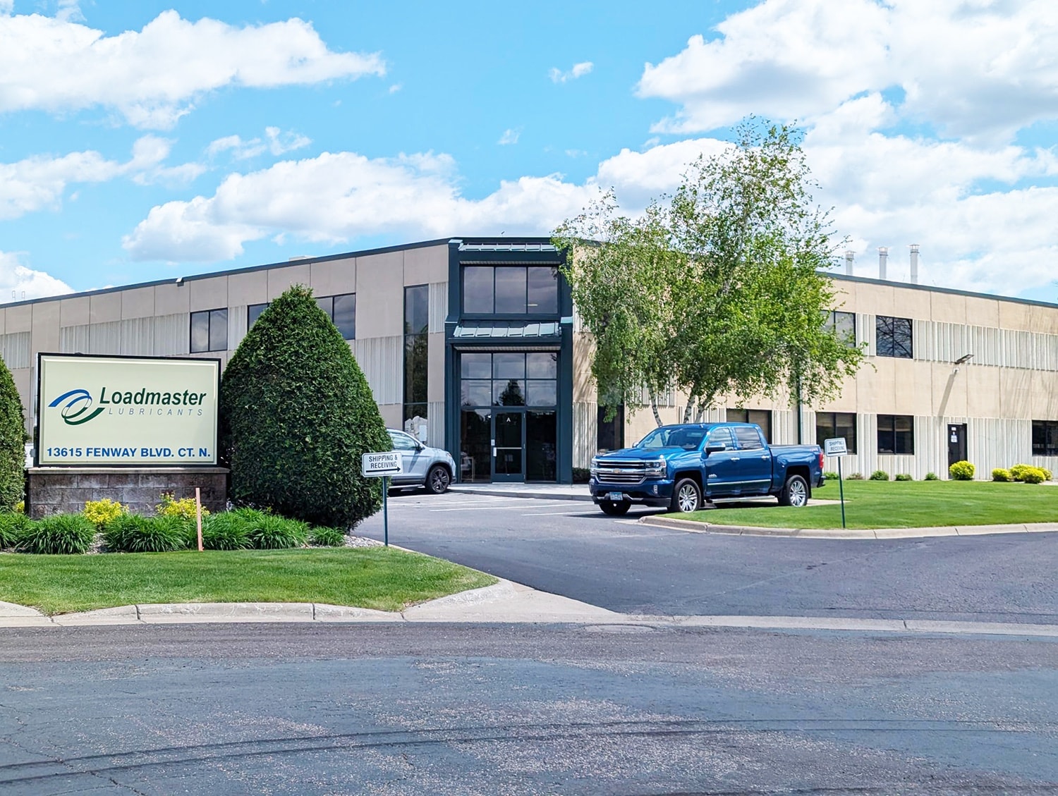 Loadmaster lubricants facility entrance and sign in Hugo, MN