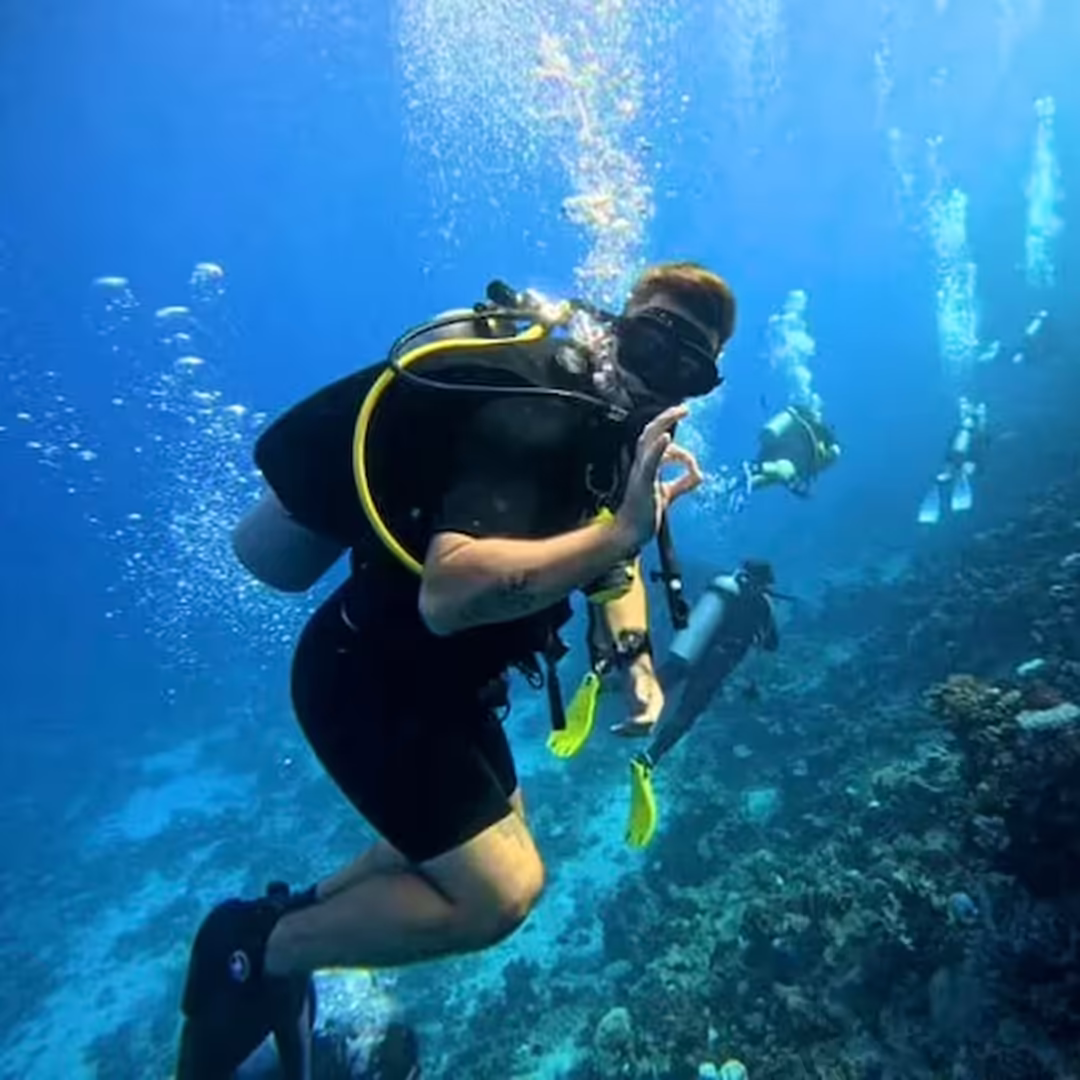 Personal trainer and physiotherapist Simon Petersen from Nordic Performance Training diving in the Mediterranean Ocean — highlighting an active lifestyle, balance, and love for movement beyond the gym.