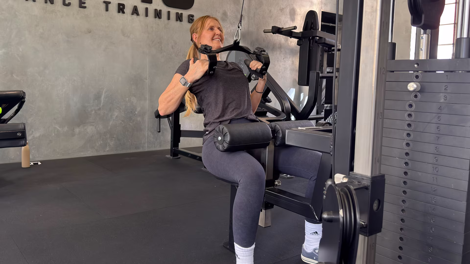 Marie-Louise performing Cable Pulldowns at Nordic Performance Training.