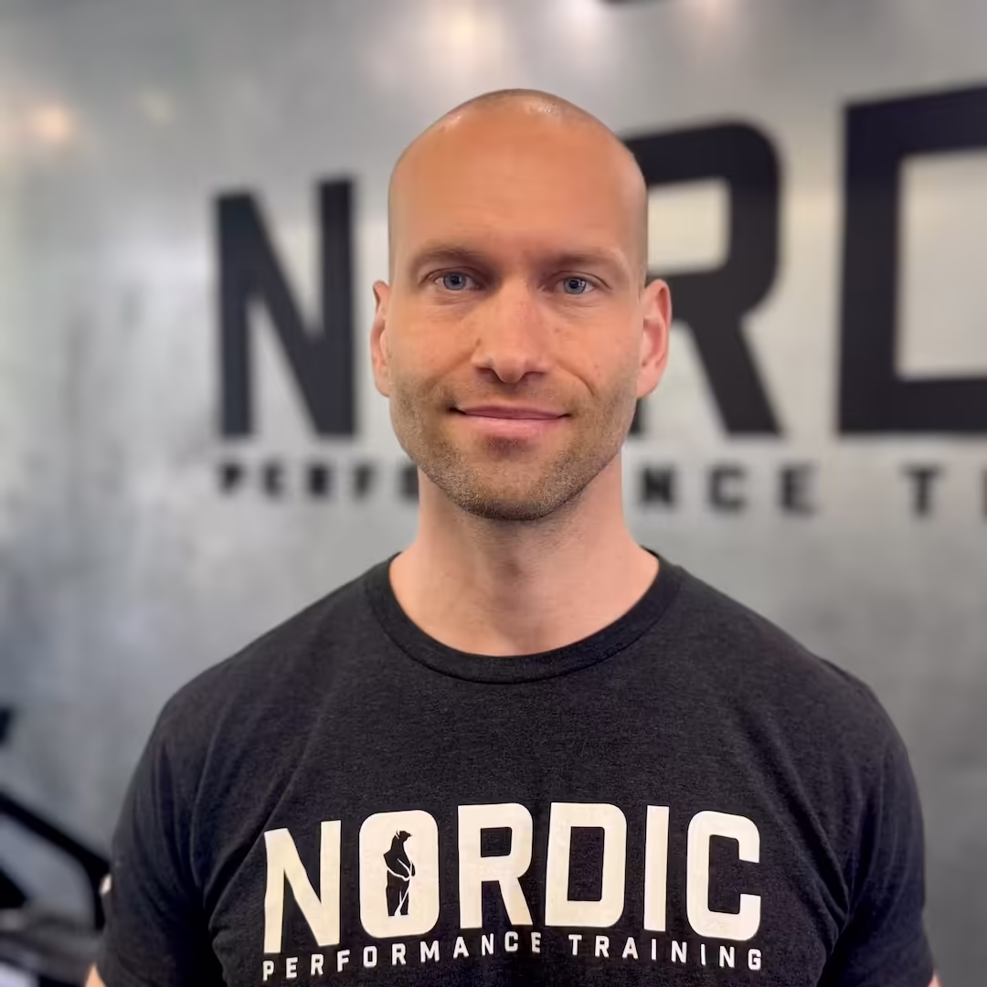 Personal trainer and physiotherapist Lucas Iversen at Nordic Performance Training in Copenhagen — co-founder and expert in structured strength training, consistency, and sustainable results.