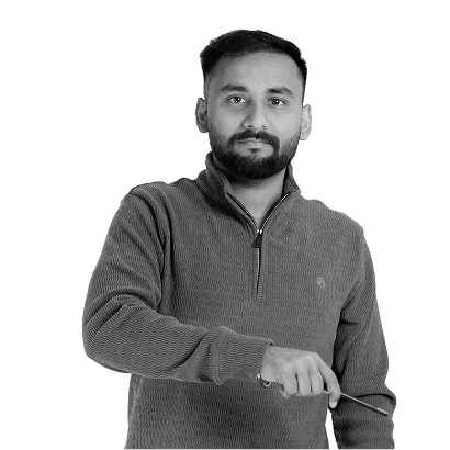 Shivesh, Team Lead, posing confidently with a tool in hand