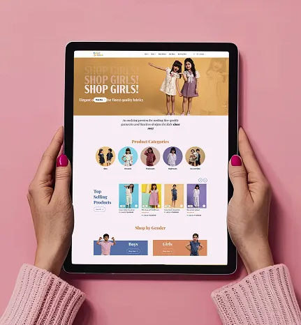 Tablet showing kids fashion eCommerce website with shop-by-gender categories – part of Pixel Dino’s retail design portfolio