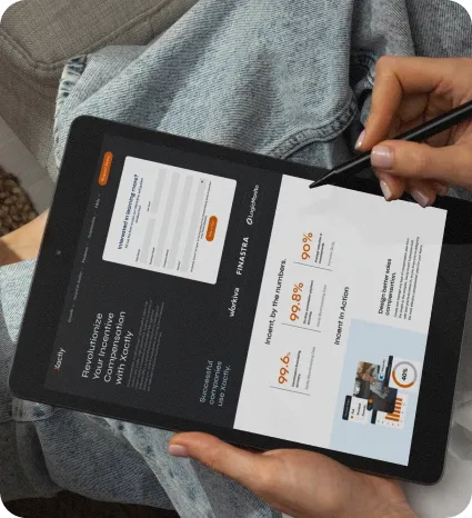 Person using a stylus on a tablet displaying the Xactly website, featuring a conversion-focused landing page with performance metrics and a lead capture form.