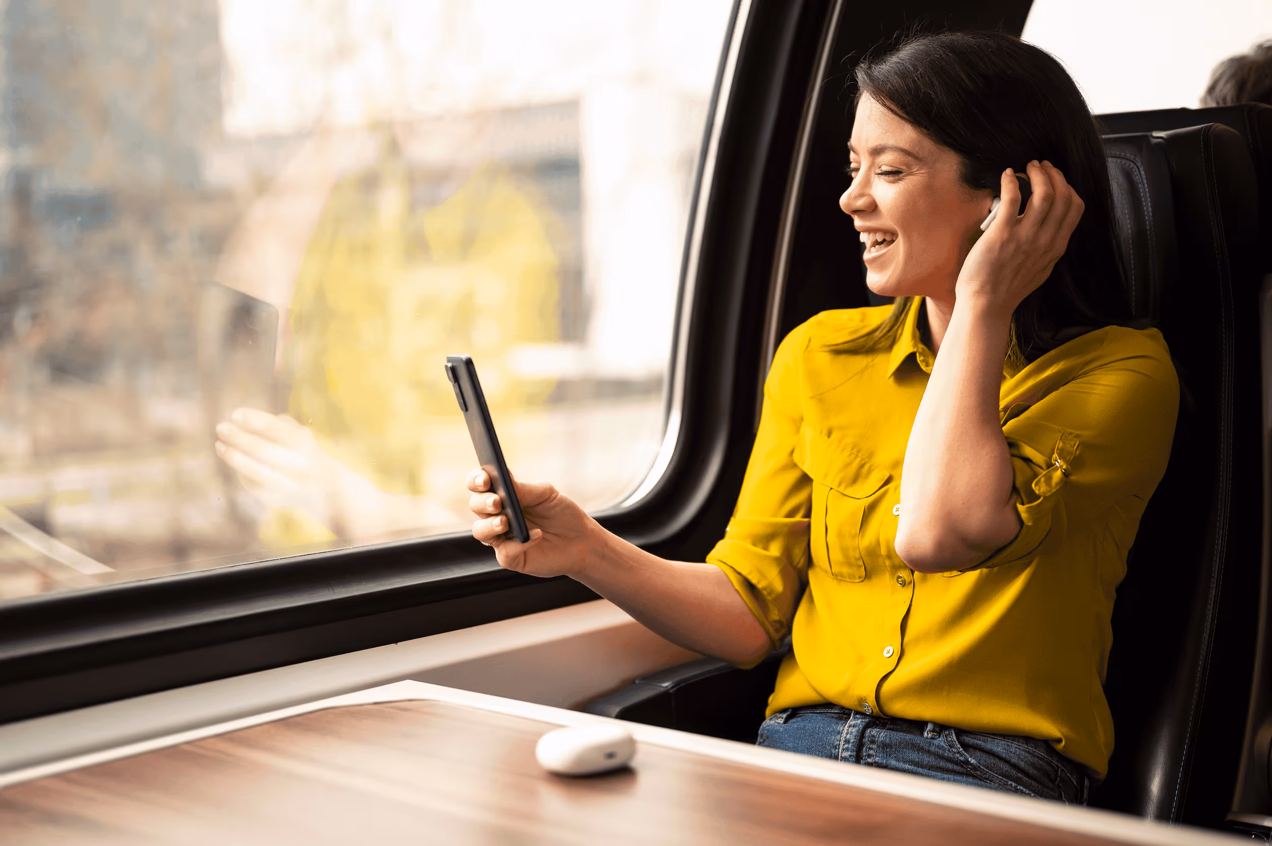 lady on a call on a train