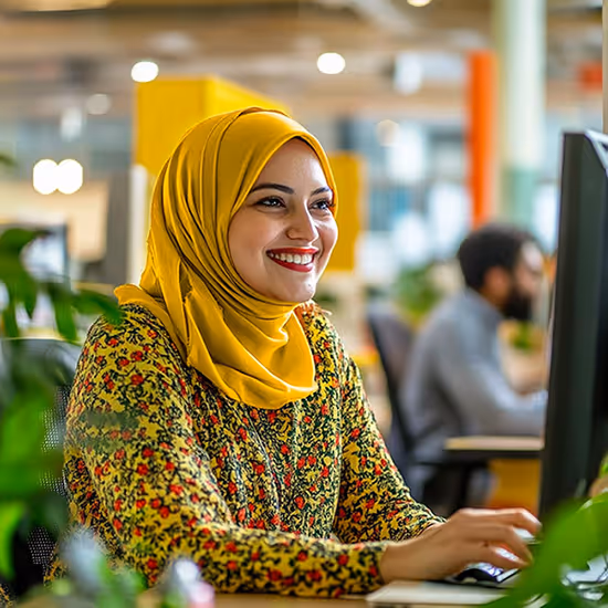 a lady working at a computer