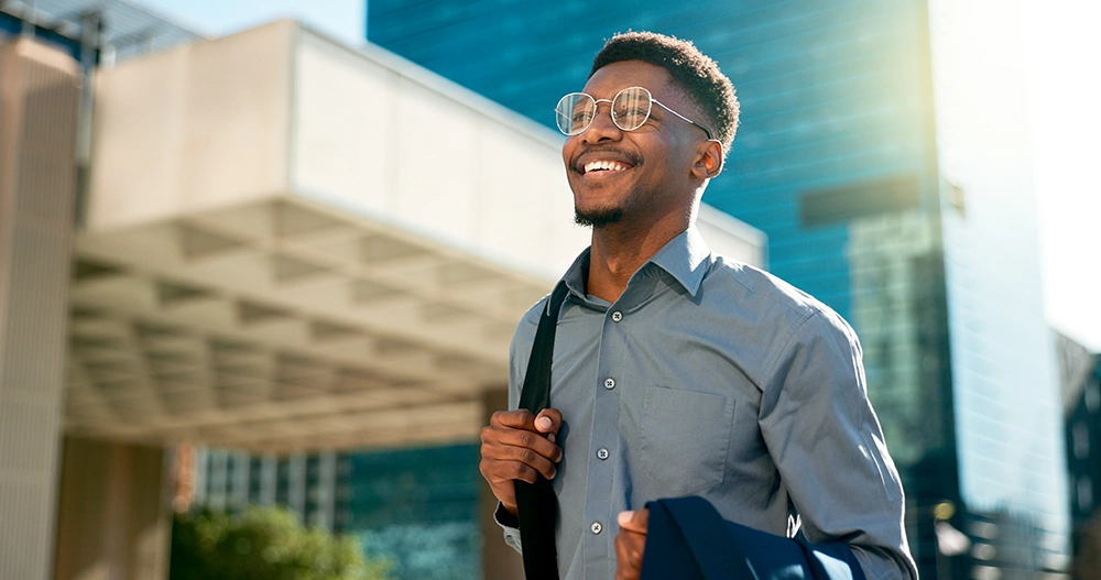 man in a city with a formal shirt