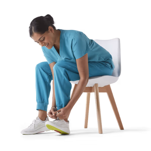 Nurse putting on Toffeln trainers