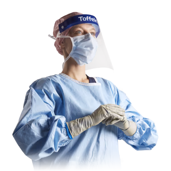 Theatre nurse wearing Toffeln surgical gown