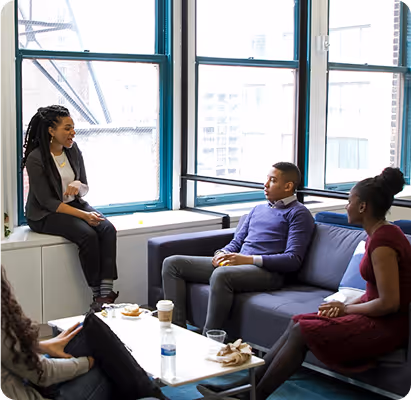 a group of people sitting on a couch