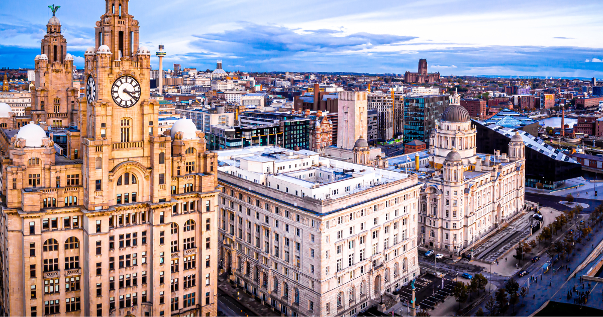 Aerial shot of Liverpool skyline at sunset.