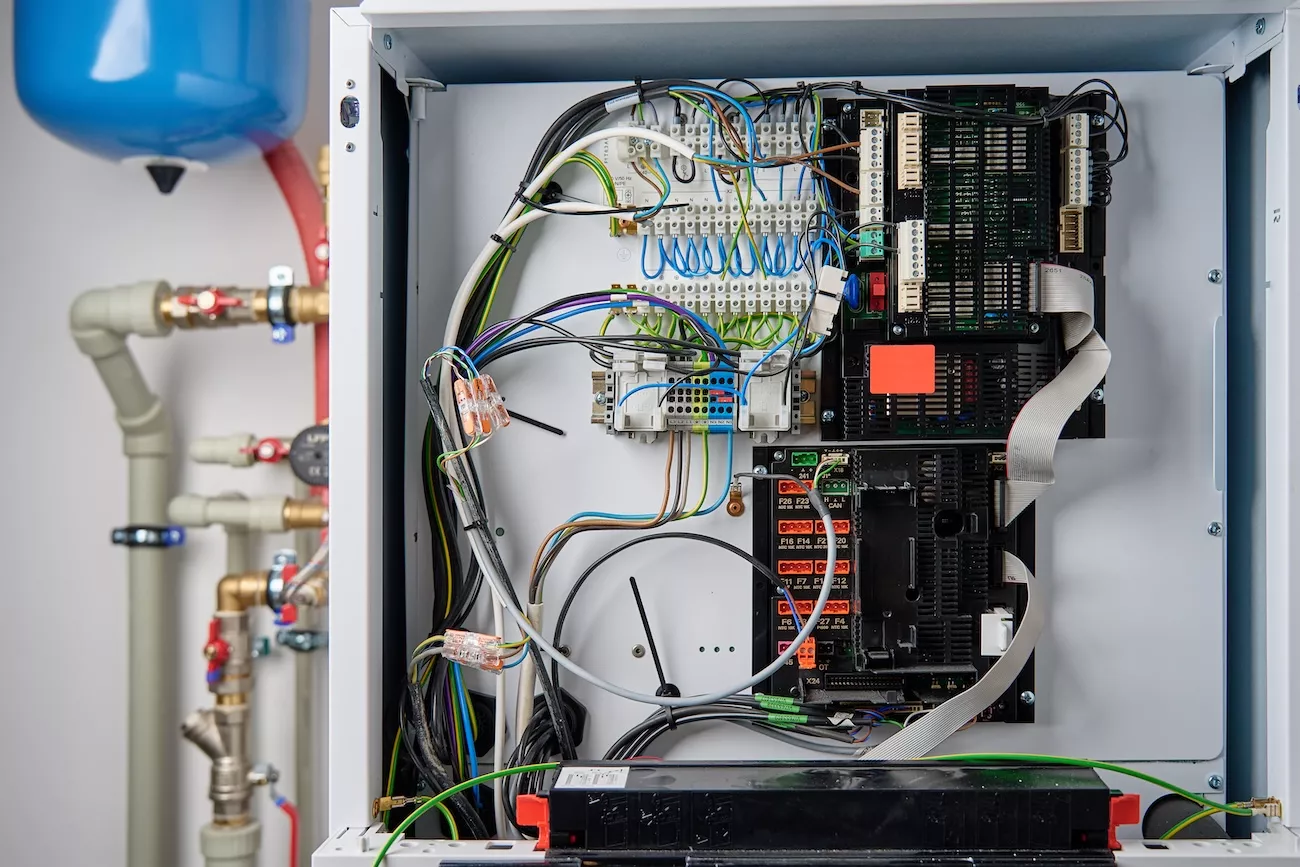 Boiler control settings open for maintenance. 