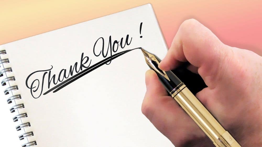 Hand written thank you with a fountain pen black ink