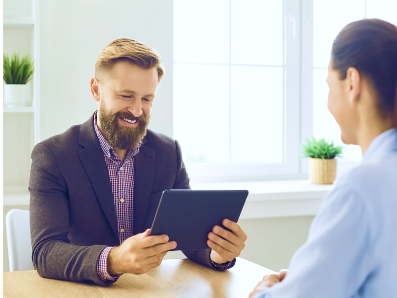 Bank employee using secure, pre-enrolled tablet with Bento MDM.