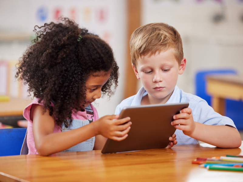 Image showing children in a classroom using tablets running Bento MDM software