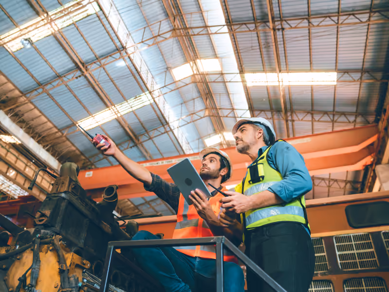 Image showing factory workers using tablets running Bento MDM software