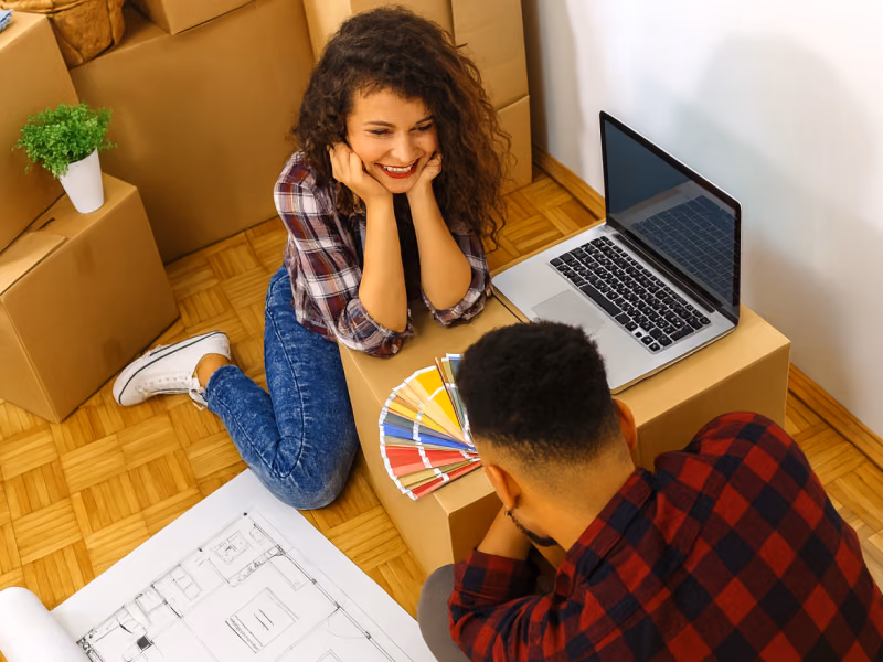 Image showing two people consulting over color palette
