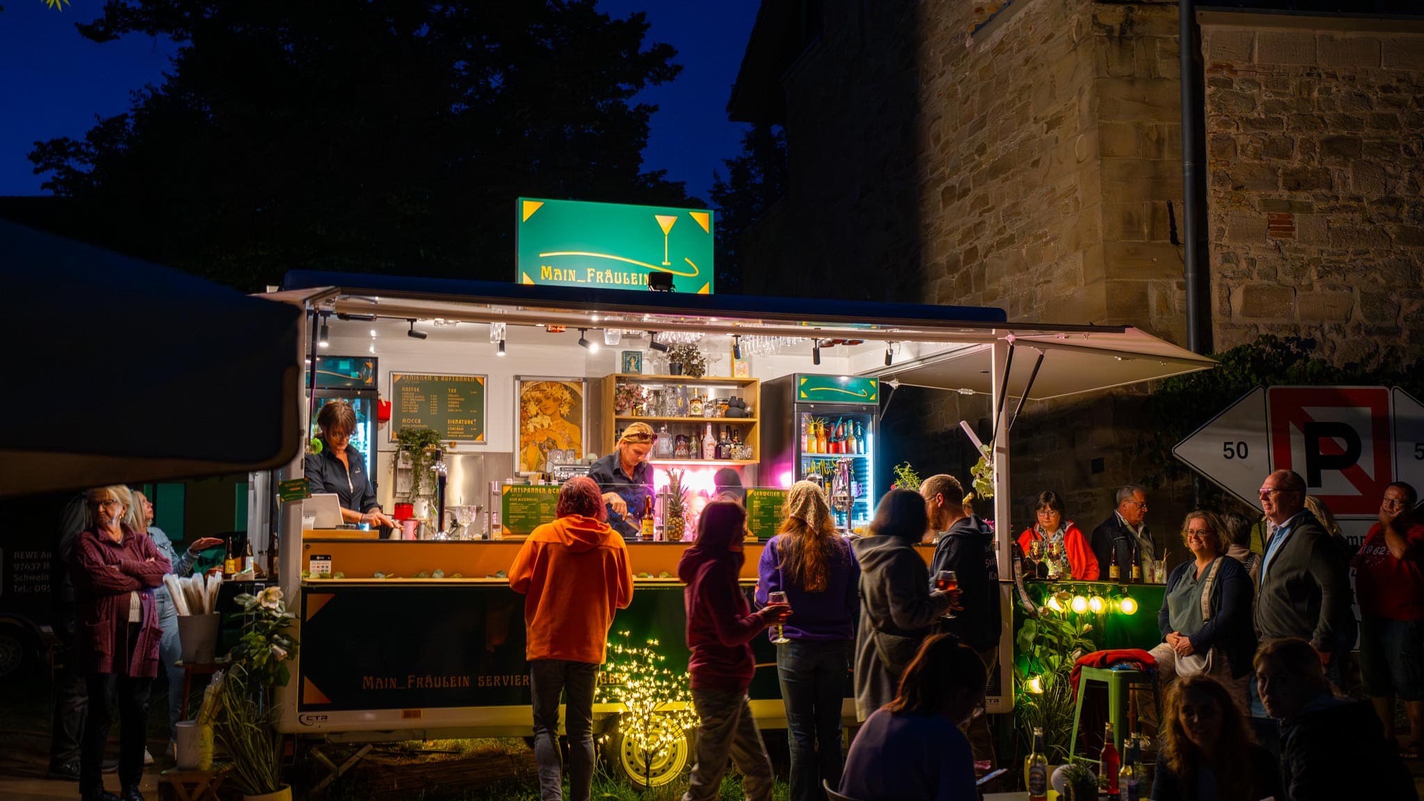 [background image] image of an outdoor eating area (for a food truck)