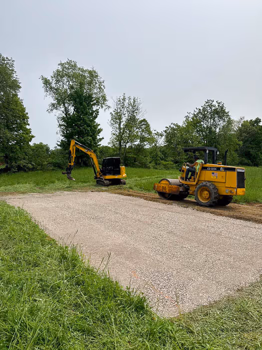 A freshly installed gravel shed pad in Camden, NY with PSR equipment in the background