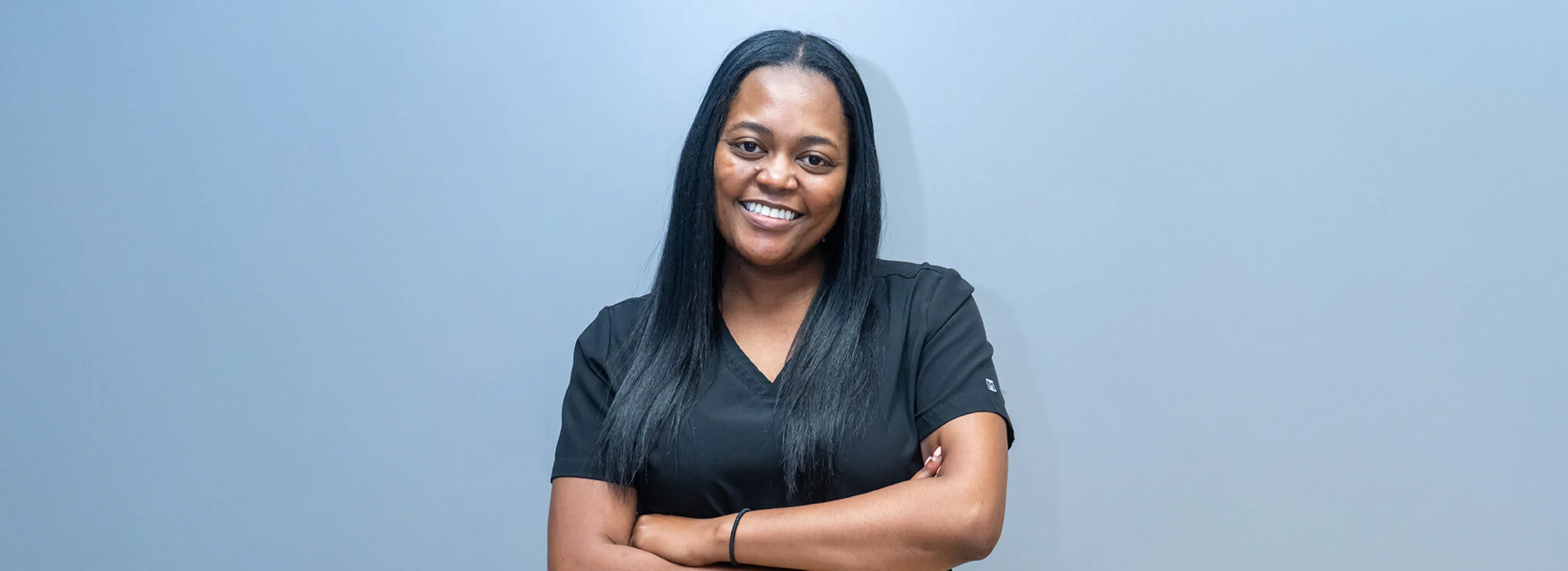 Cracked Tooth Repairin Wesley Chapel, FL | Apex Dental team member smiling