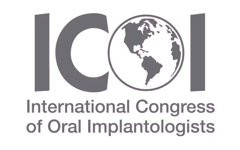 Logo of the International Congress of Oral Implantologists featuring the abbreviation ICOI with a globe depicting the Americas inside the letter O.