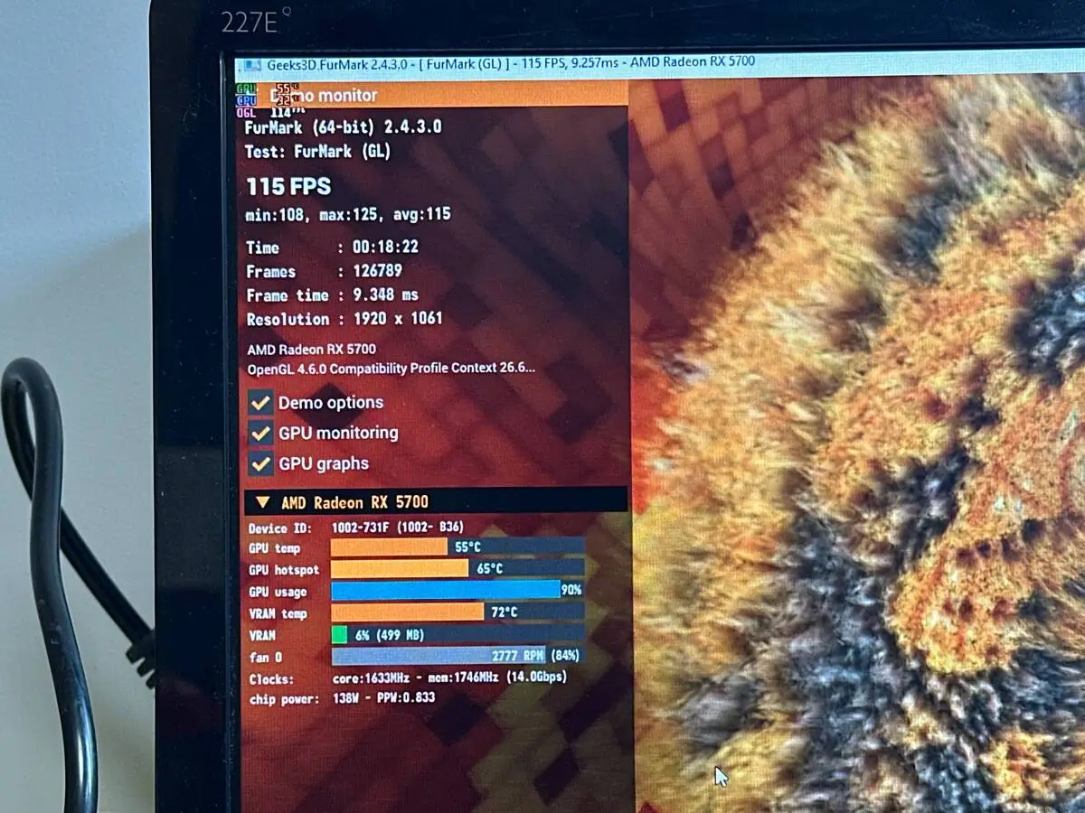 Стресс-тест FurMark видеокарты RX 5700 после чистки: температура GPU 55 °C, hotspot 65 °C