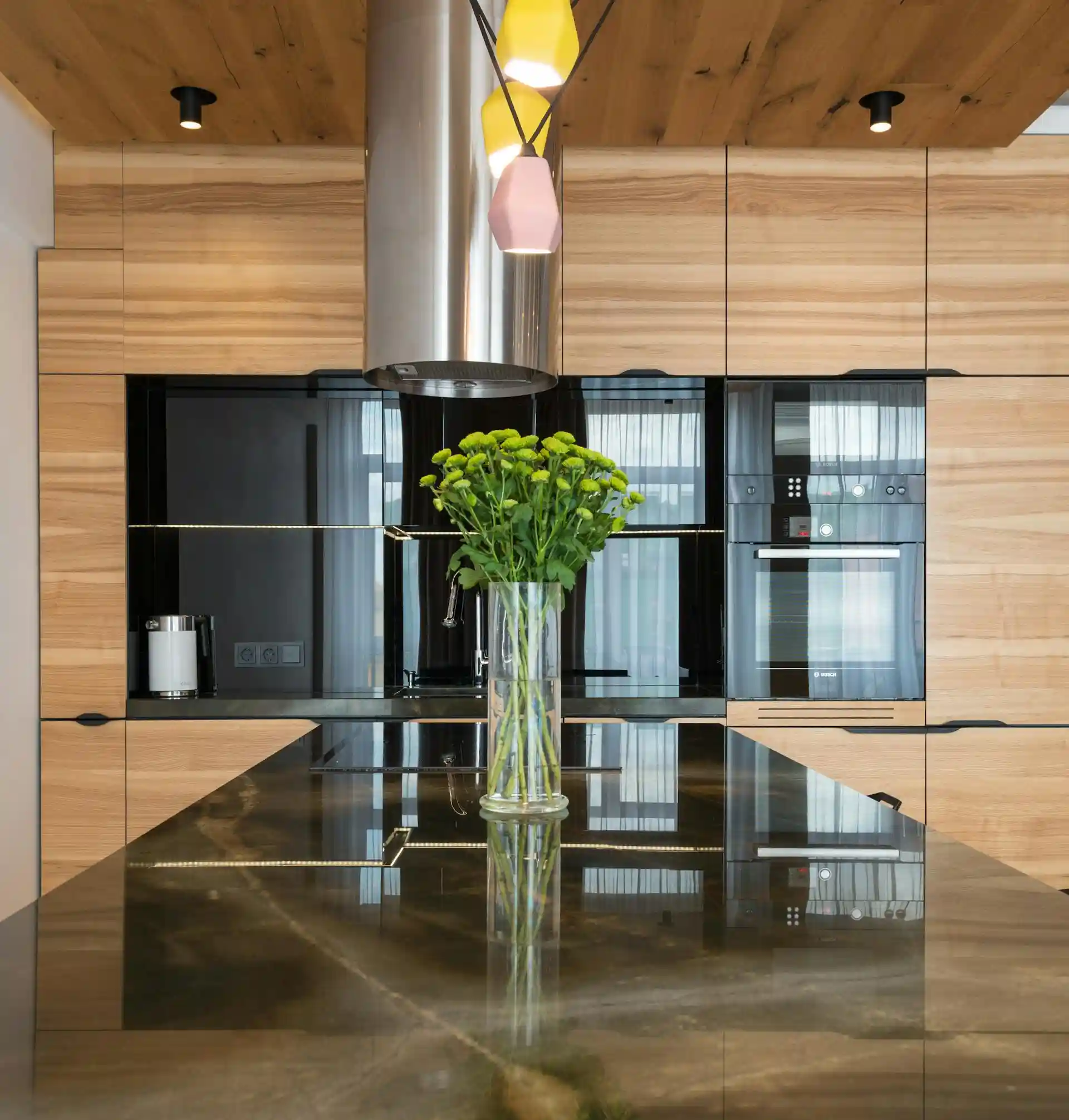 Brown kitchen with plant on desk