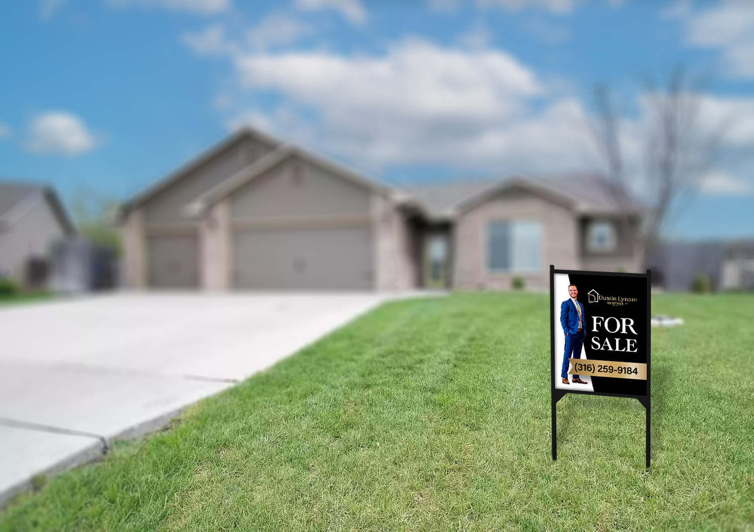 Front yard of a suburban house with a real estate for sale sign featuring a man in a blue suit and a contact phone number.