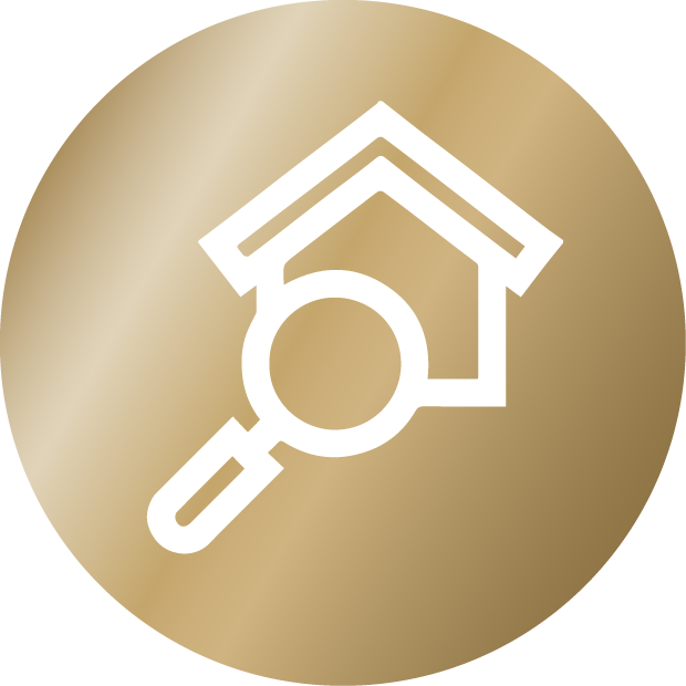 White magnifying glass over a house icon inside a gold circular background.
