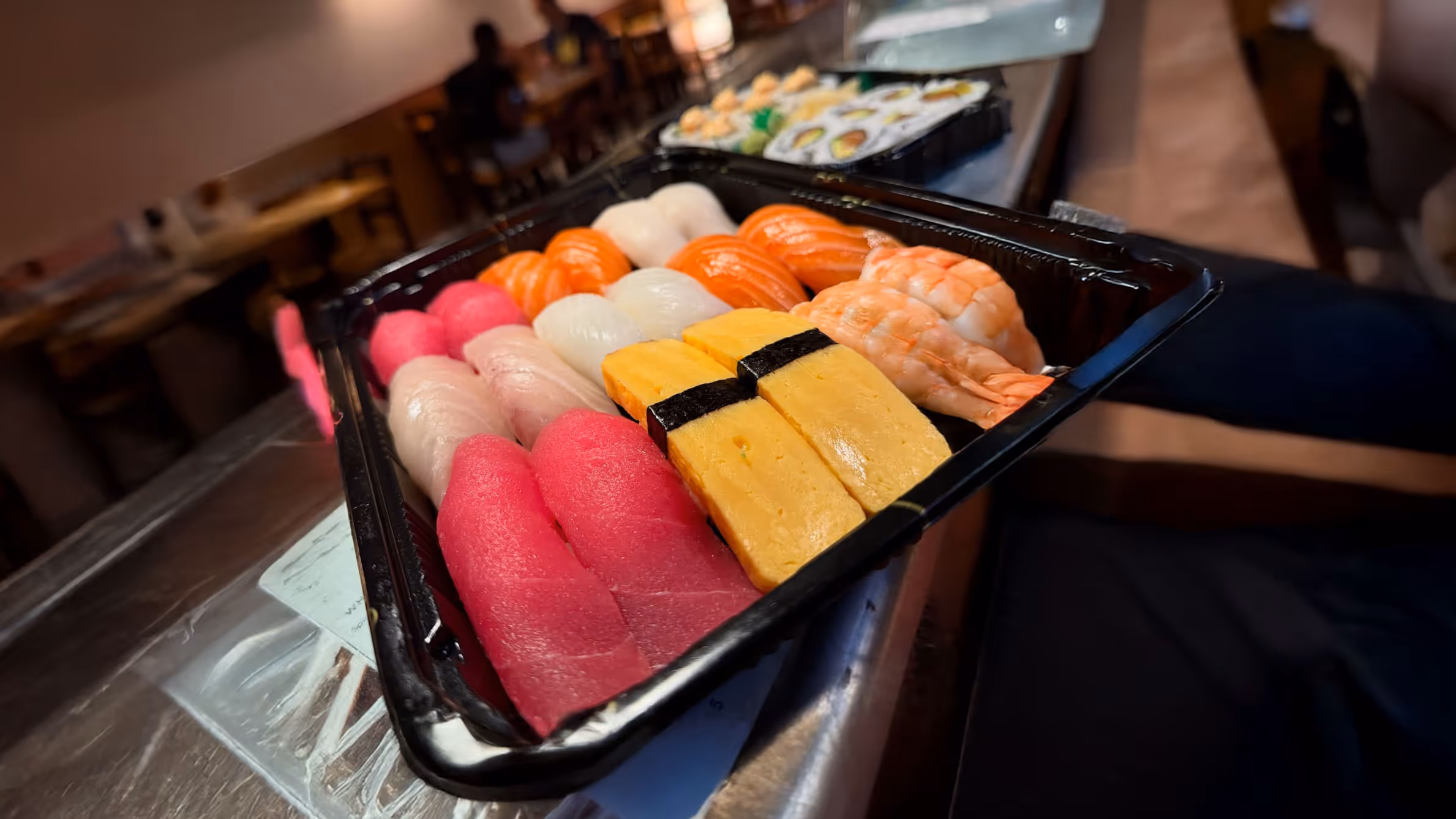 A beautifully arranged tray of sushi.