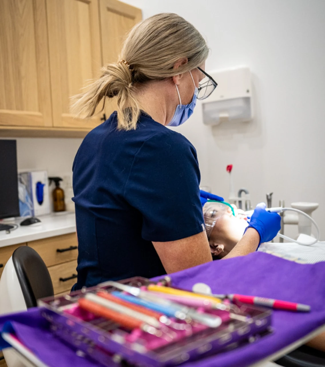 SMiiL Heights registered dental hygienist preparing sterilized dental tools for patient care