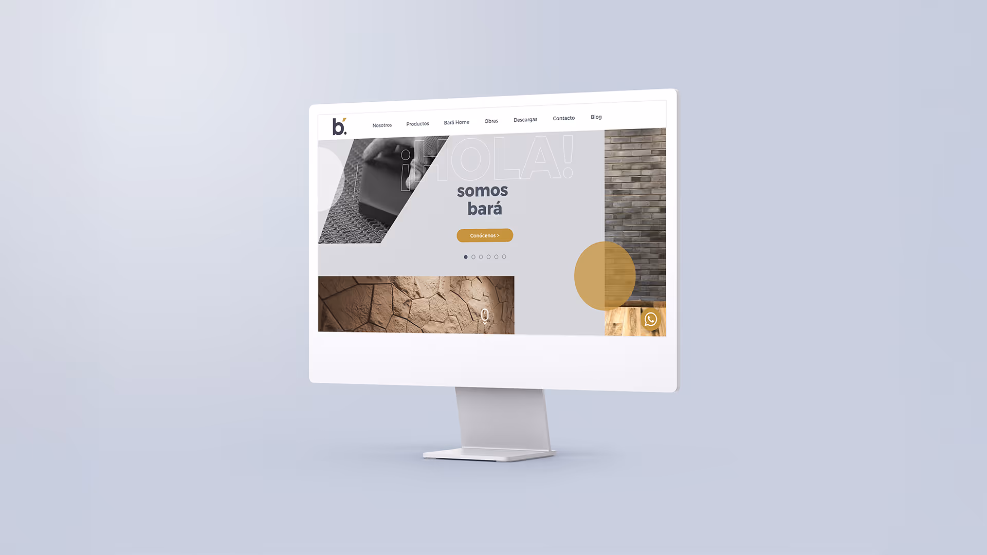 Desktop monitor displaying the homepage of Bará's website.