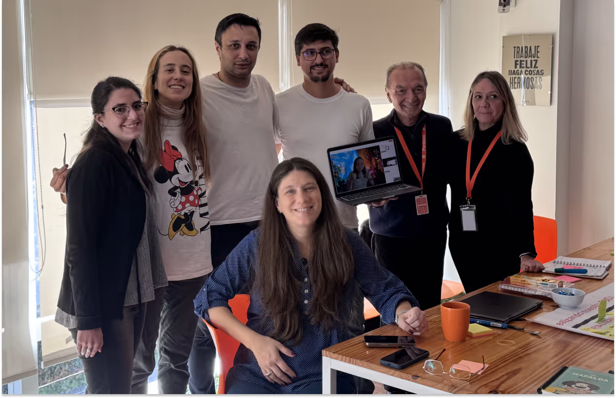 Portinos team posing together at the office.