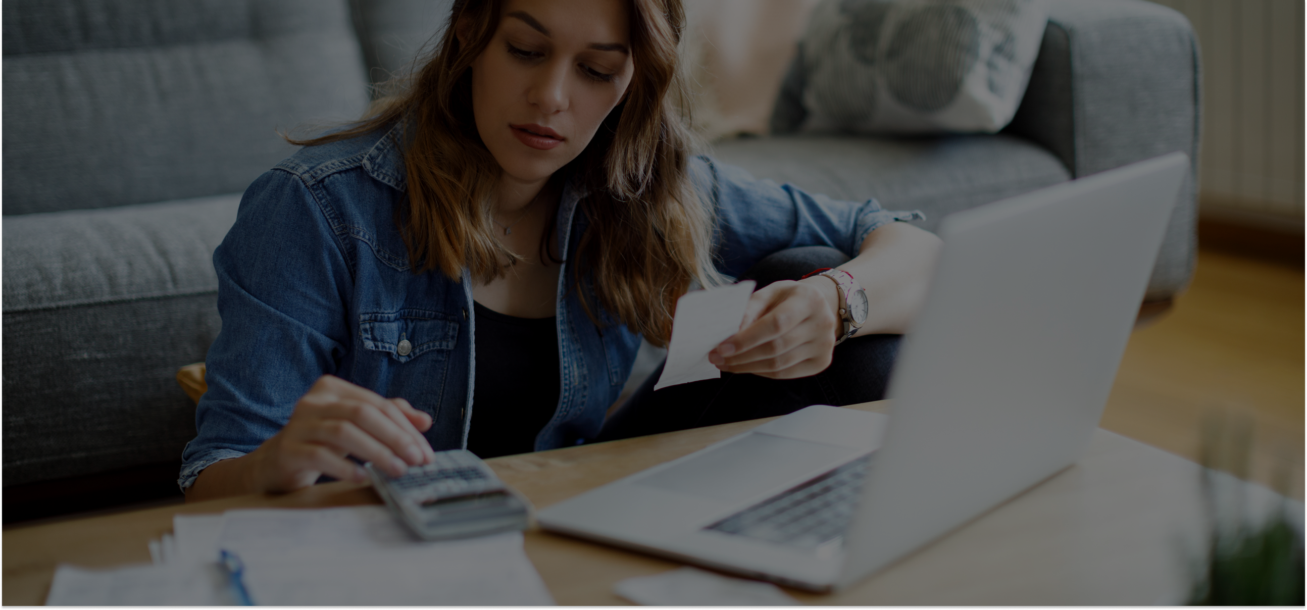 Business owner analyzing sales and revenue data on a digital screen – representing warning signs that a Shopify store may be losing money