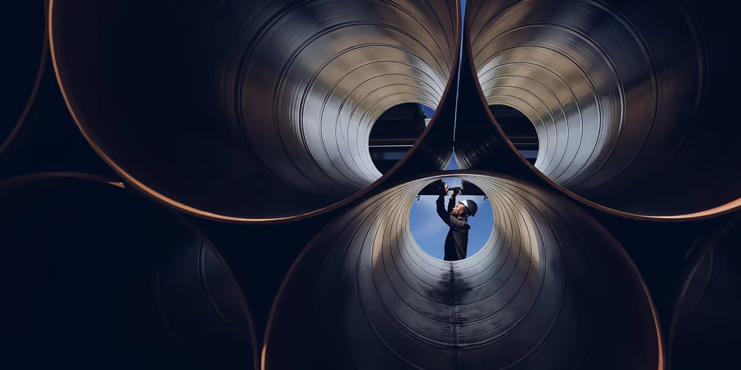 man working with pipe