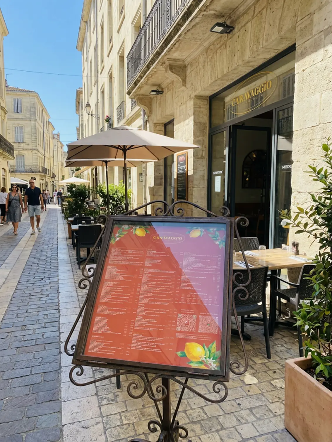 Supports print du restaurant Caravaggio à Montpellier : affiche et porte cartes