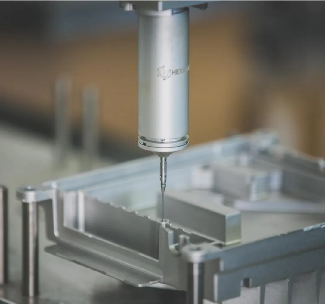 Precision measurement probe analyzing cast metal component.
