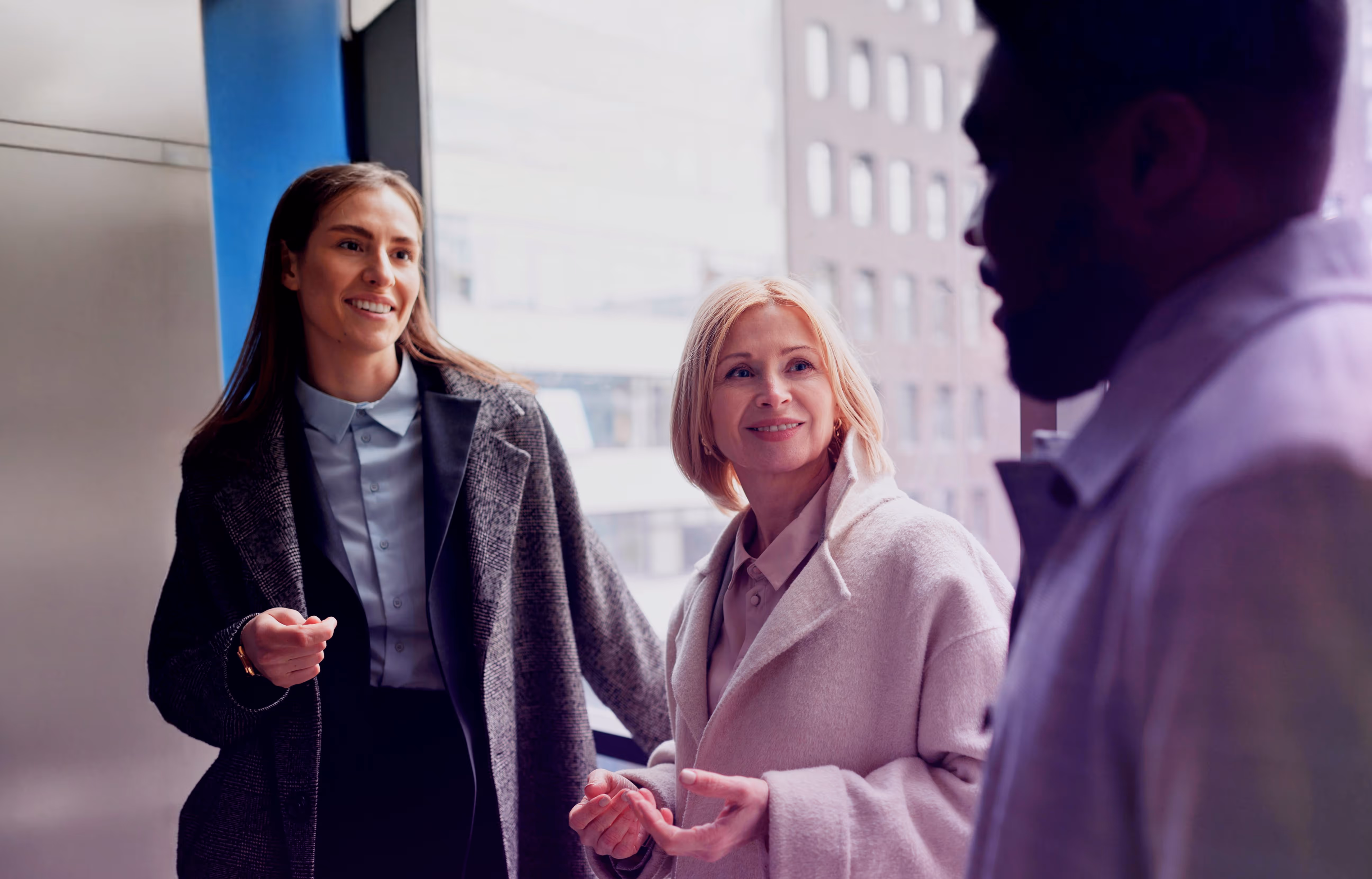 Image of a diverse team engaged in a discussion - Sparagus.