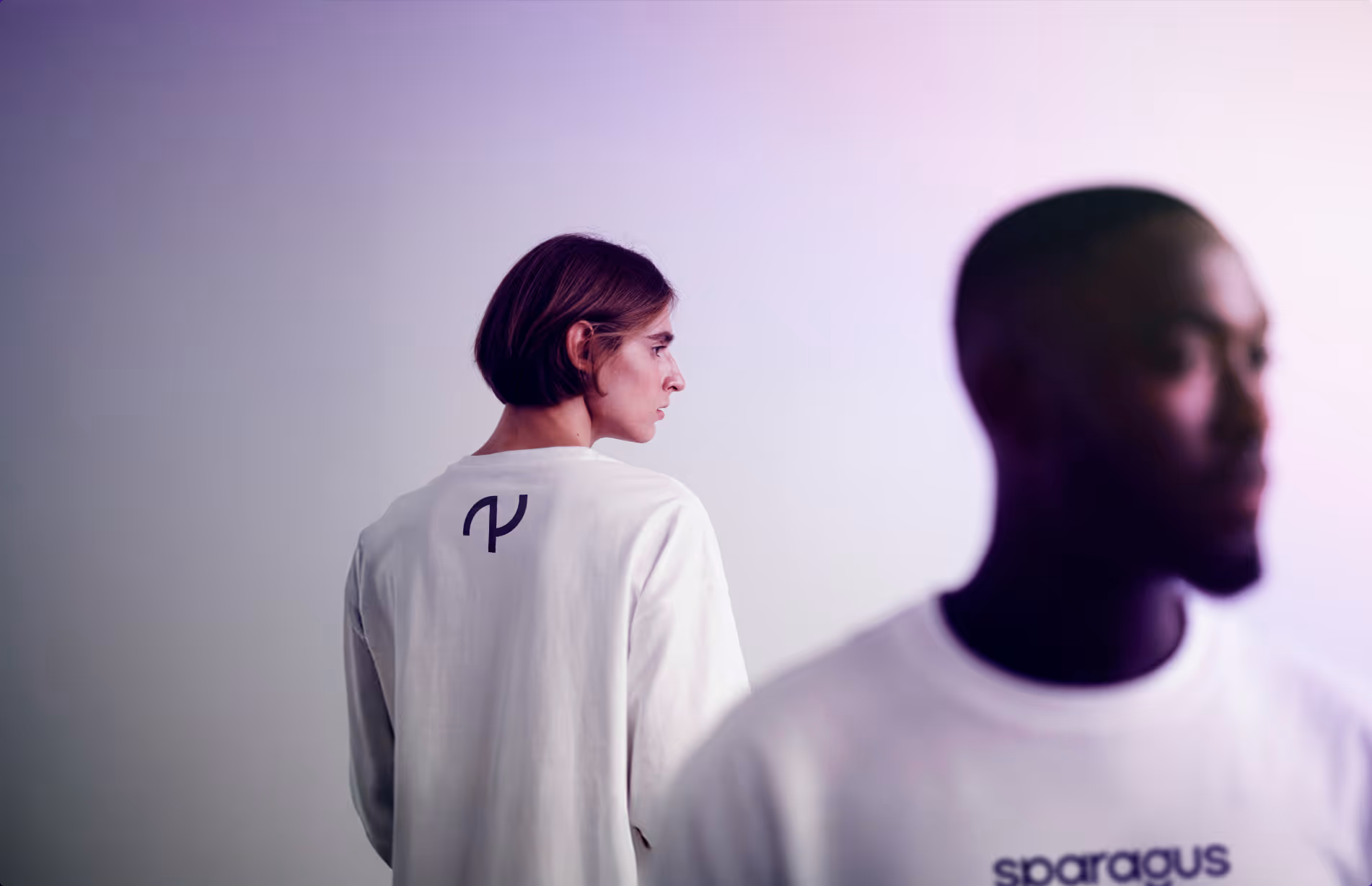 Image of two people in white attire, symbolizing unity and professionalism - Sparagus.