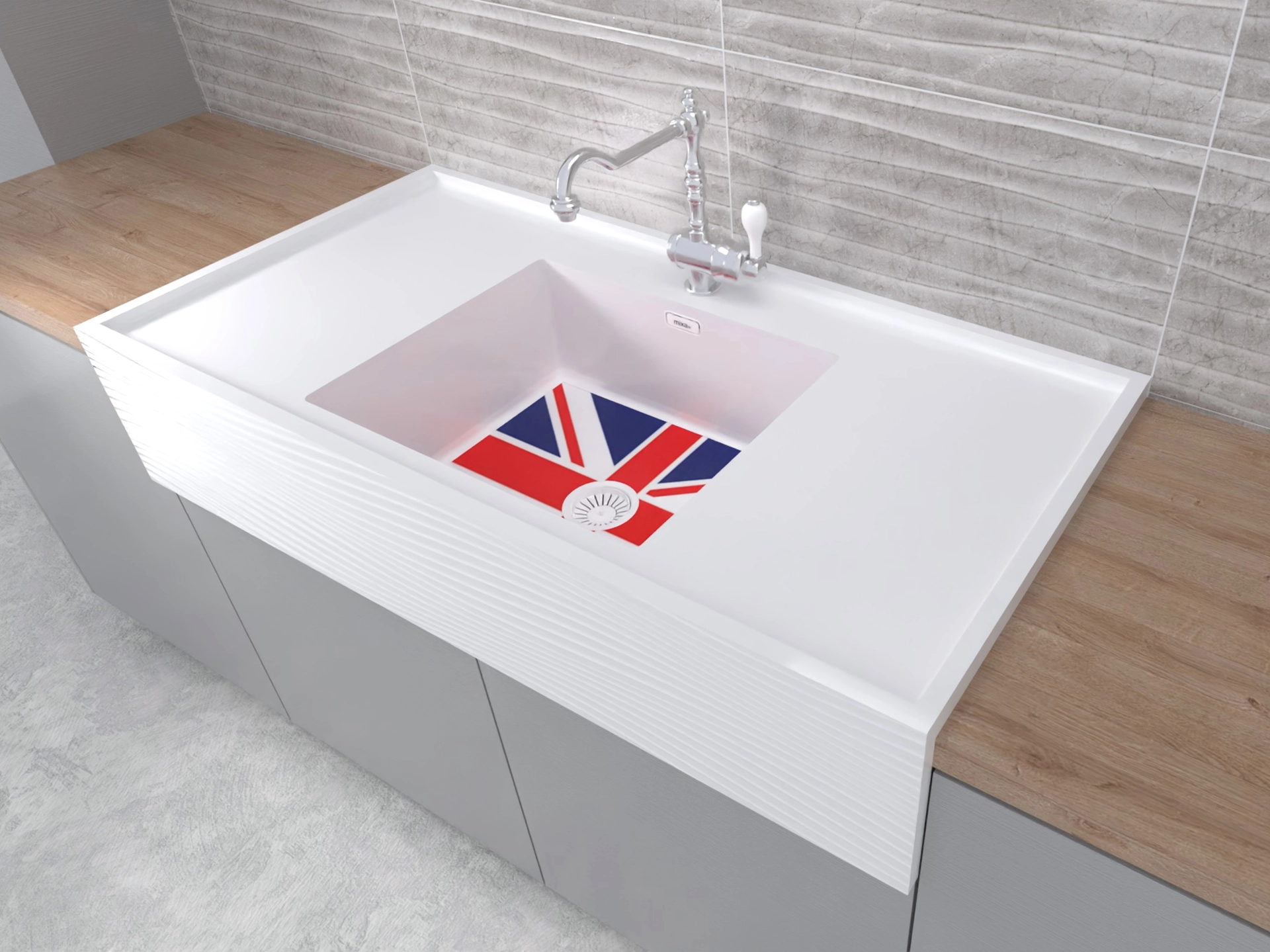 Modern white kitchen sink with a chrome faucet and a Union Jack flag design at the bottom of the basin.